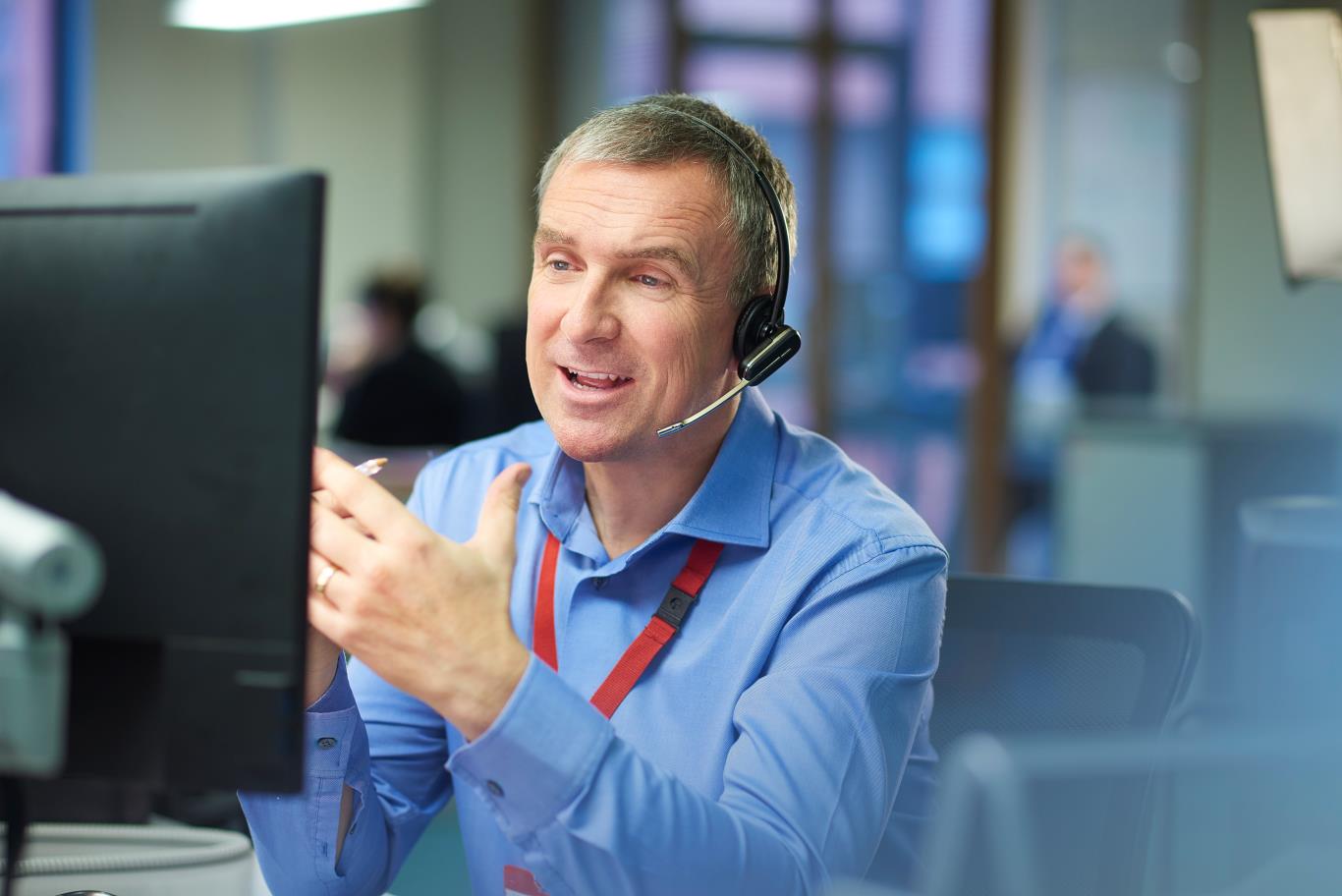 Image of customer service employee on phone call 